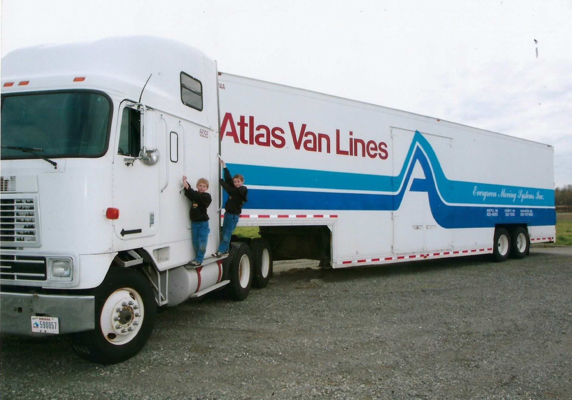 Atlas Van Lines tractor trailer parked at an Evergreen Moving Systems facility